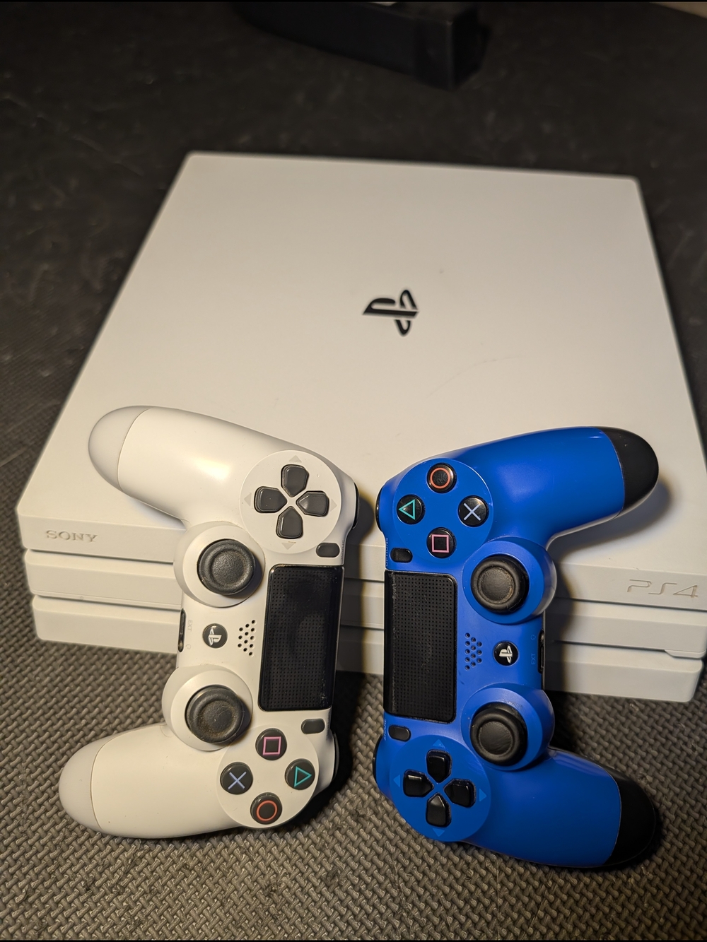 Sony PlayStation 4 Pro Console with DualShock 4 Controllers